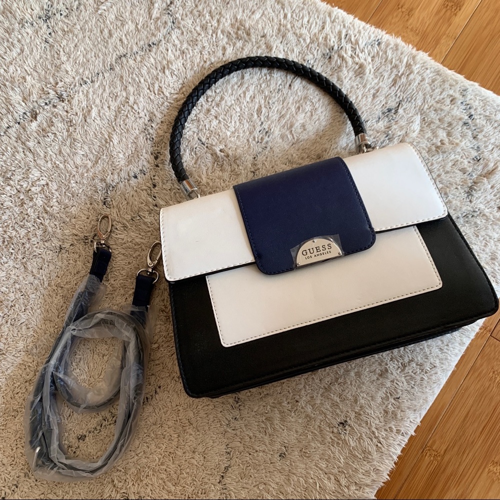 black white and blue guess purse bag